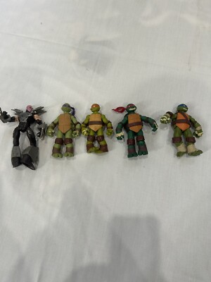 LOT OF 5 NINJA TURTLE FIGURINES 2012