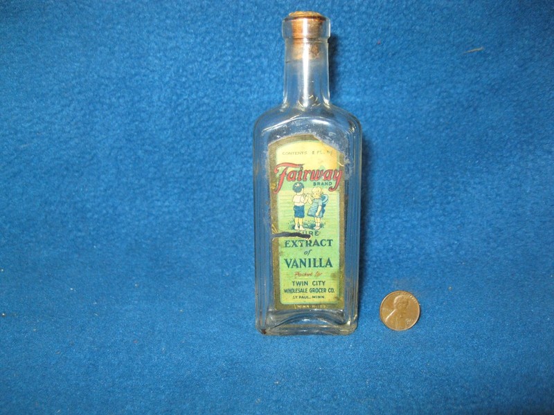Vintage Antique Fairway Boy and Girl Extract of Vanilla bottle