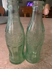 Vintage Coke Cola bottles