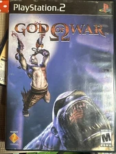 God of War - Sony PlayStation 2 Has 2 Cover options. Original is behind