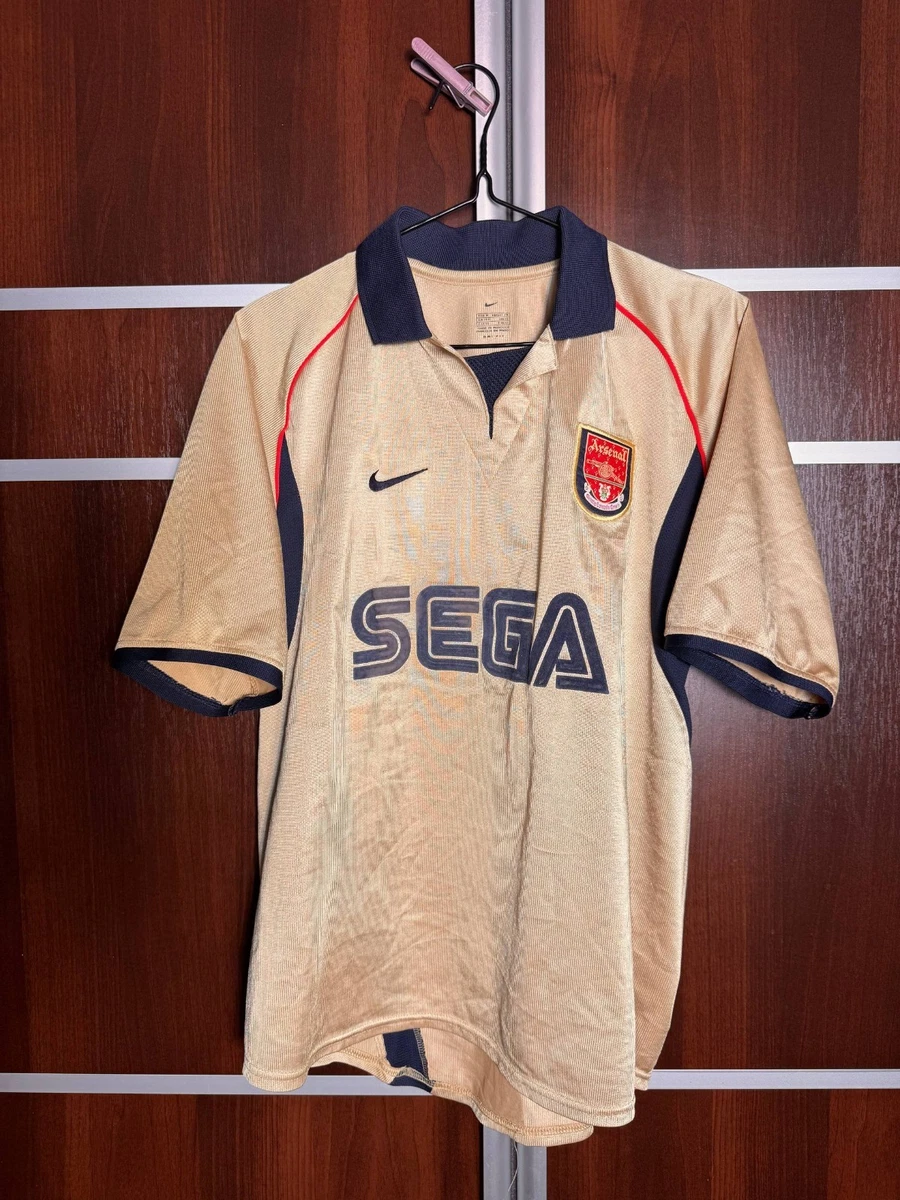 Preços baixos em Nike Arsenal Gold International Club fã de