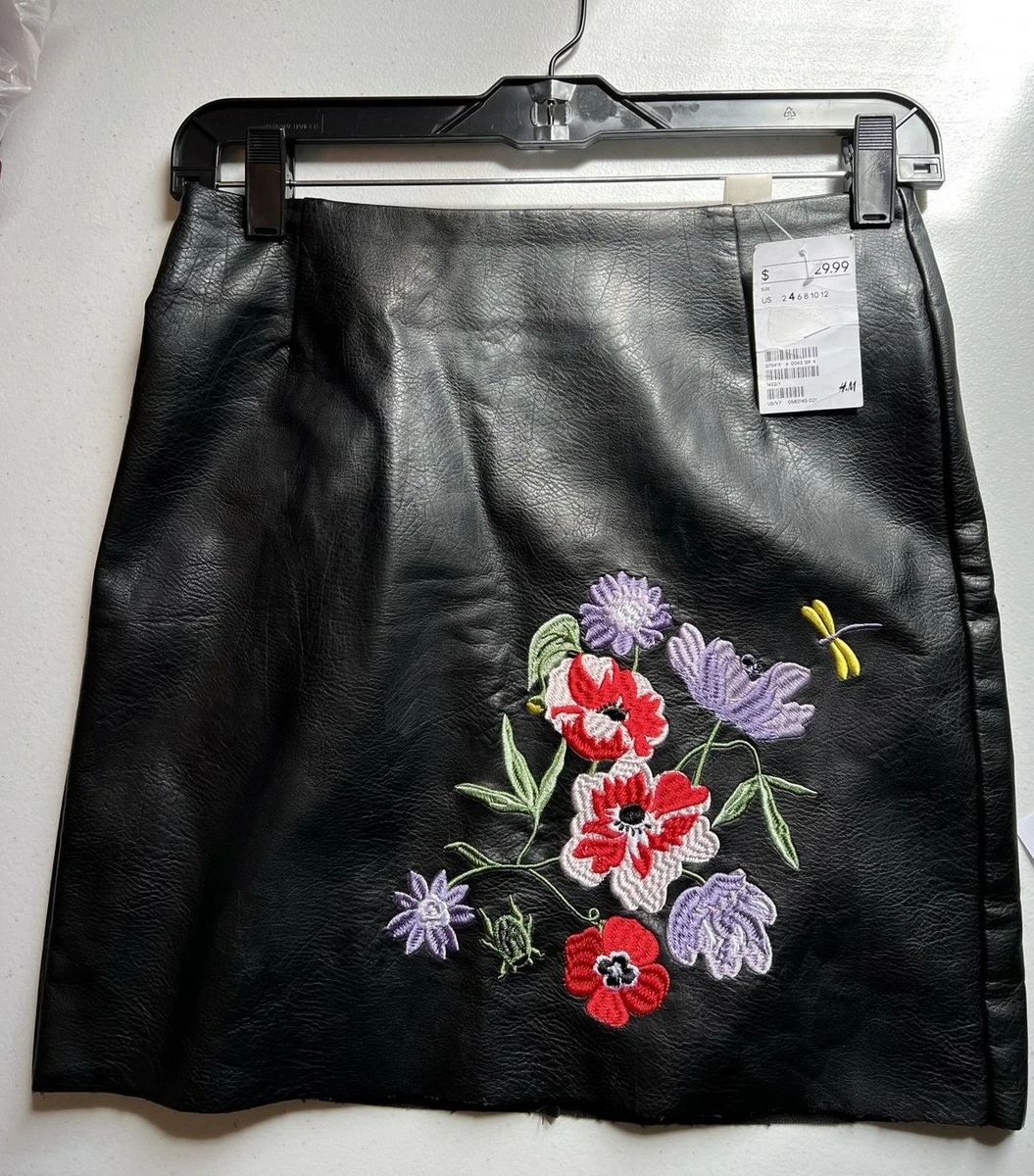 Black leather top embroidered skirt