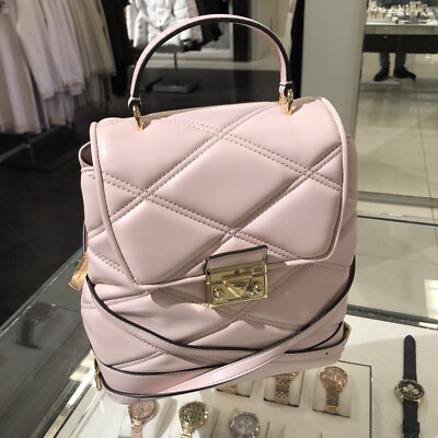 Michael Kors Serena MD Quilted Leather Flap Backpack Handbag  display picture 1