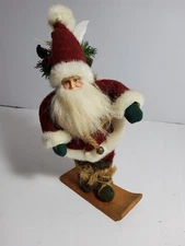 Handcrafted Folk Art Santa Figurine on Wooden Skis Primitive Christmas Decor