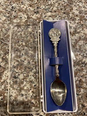 Apollo 13 collectible spoon, with Pictures And names of the three astronauts.  2
