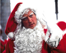 * JIM BELUSHI * signed 8x10 photo * JINGLE ALL THE WAY * COA *