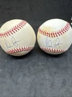 2 Nolan Ryan Autographed Baseballs