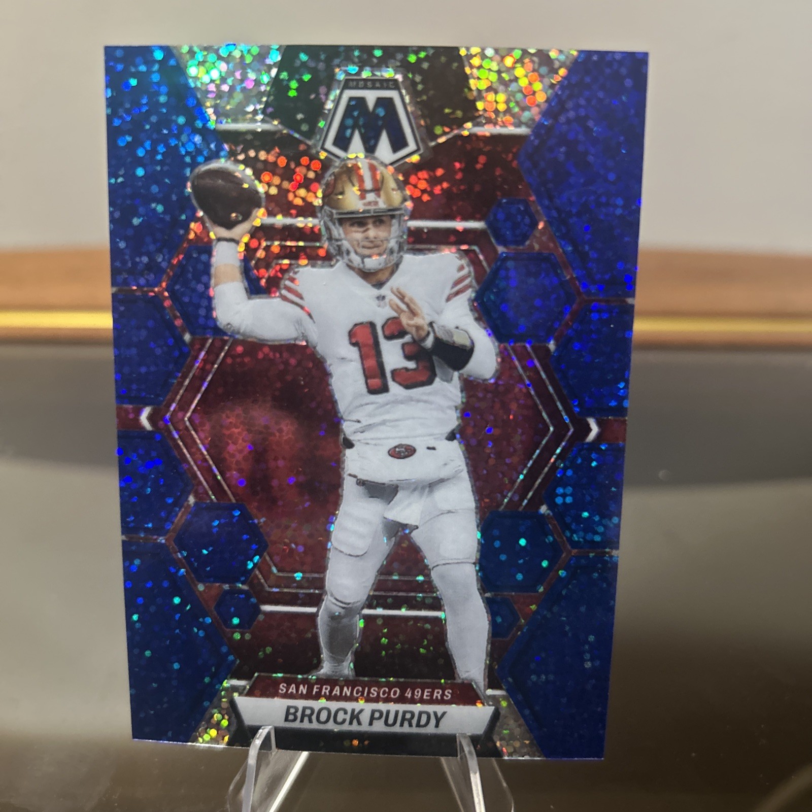 2023 Panini Mosaic - Brock Purdy #211 Blue Sparkle Prizm /96