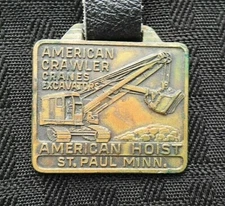 AMERICAN HOIST & DERRICK CRAWLER CRANES EXCAVATORS BRASS WATCH FOB ST PAUL MN MN