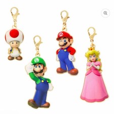 Juego de 4 dijes de Super Mario Bros: Mario, Luigi, sapo, melocotón,