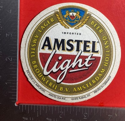 AMSTEL LIGHT HEINEKEN HOLLAND 4.2 INCH ROUND  BEER COASTER BLUE SHIELD