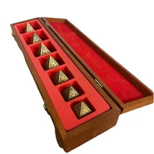 7 BRASS NESTING PYRAMID PAPERWEIGHTS * A WOODEN BOXED SET * ANCIENT EGYPT OFFICE