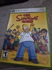 The Simpsons Game (Microsoft Xbox 360 Complete w/ Manual Tested. Good Disk