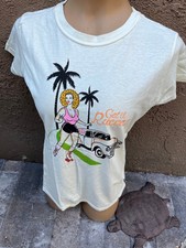 Suavecita Pomade Roller Babe Get it Rucca Graphics Beige T-shirt - Jrs Sz M