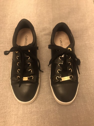 black trainers carvela