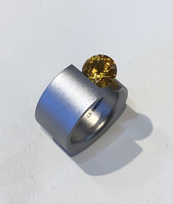 Niessing Acrobat Ring - Stainless Steel with lab-created Topaz (US 5)
