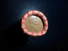 ROLL OF UNSEARCHED WHEAT PENNIES WITH 1930 AND A 1914 PENNY ON THE ENDS.