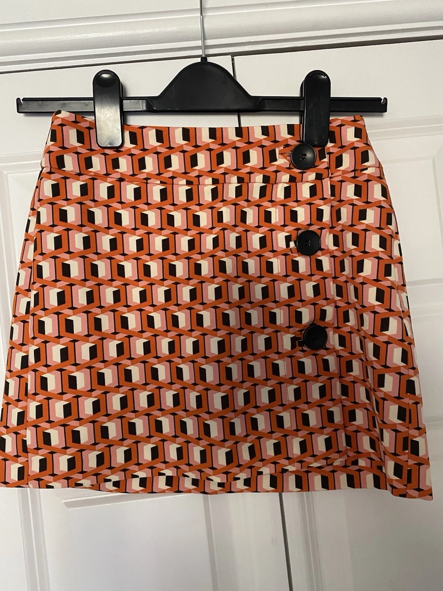Minifalda Bershka Naranja, Blanco y Negro Talla XS Excelente Estado Apenas Usada