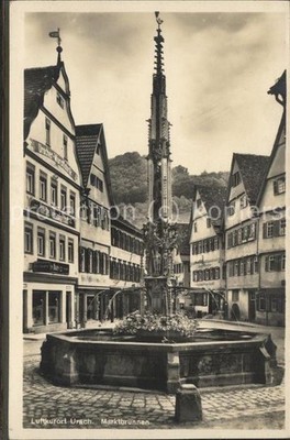 Urach Bad market fountain and sausage factory Haas left