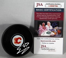 CONNOR ZARY SIGNED CALGARY FLAMES Puck NHL STAR AUTOGRAPHED JSA COA