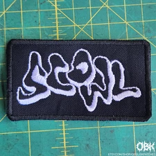Scowl ~ Embroidered Canvas Patch: Durable Weatherproof Design