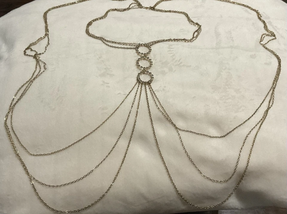 "Precioso collar, tiene 3 anillos con gemas las cadenas son 48"" de largo con 6 cadenas" Foto 4 de 4