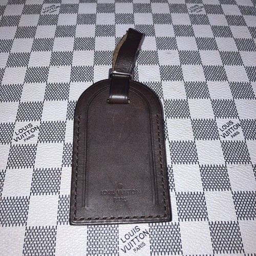 Authentic Louis Vuitton Large Dark Brown W/ Silver Hardware leather name tag.