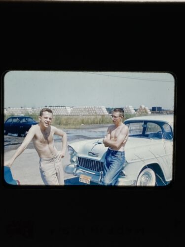 Shirtless Men Military Cigar Smoking Charleston AFB Car License Plate Red Border - Picture 1 of 3