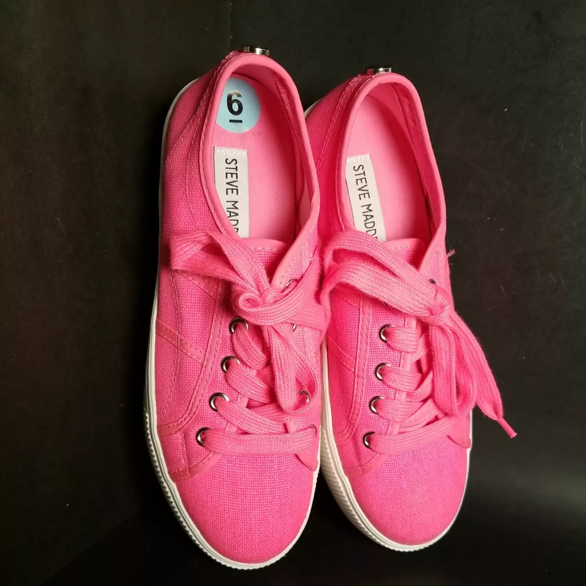 Neon pink top tennis shoes