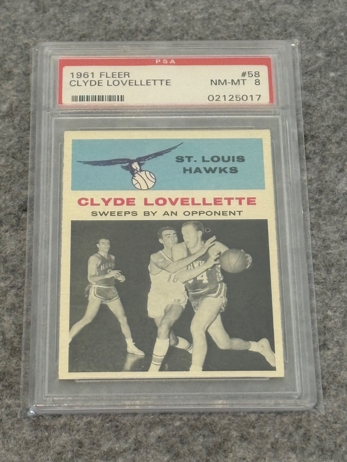 1961 Fleer Basketball #58 Clyde Lovellette In Action PSA 8