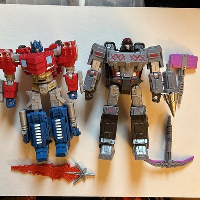 Transformers Legacy United Fractured Friendship SDCC 2024 Orion Pax Megatronus