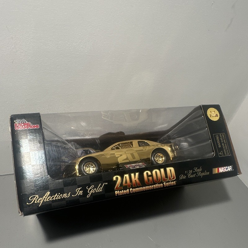 Racing Champions 1:24 24K Gold Commemorative NASCAR 50th Tony Stewart Taurus