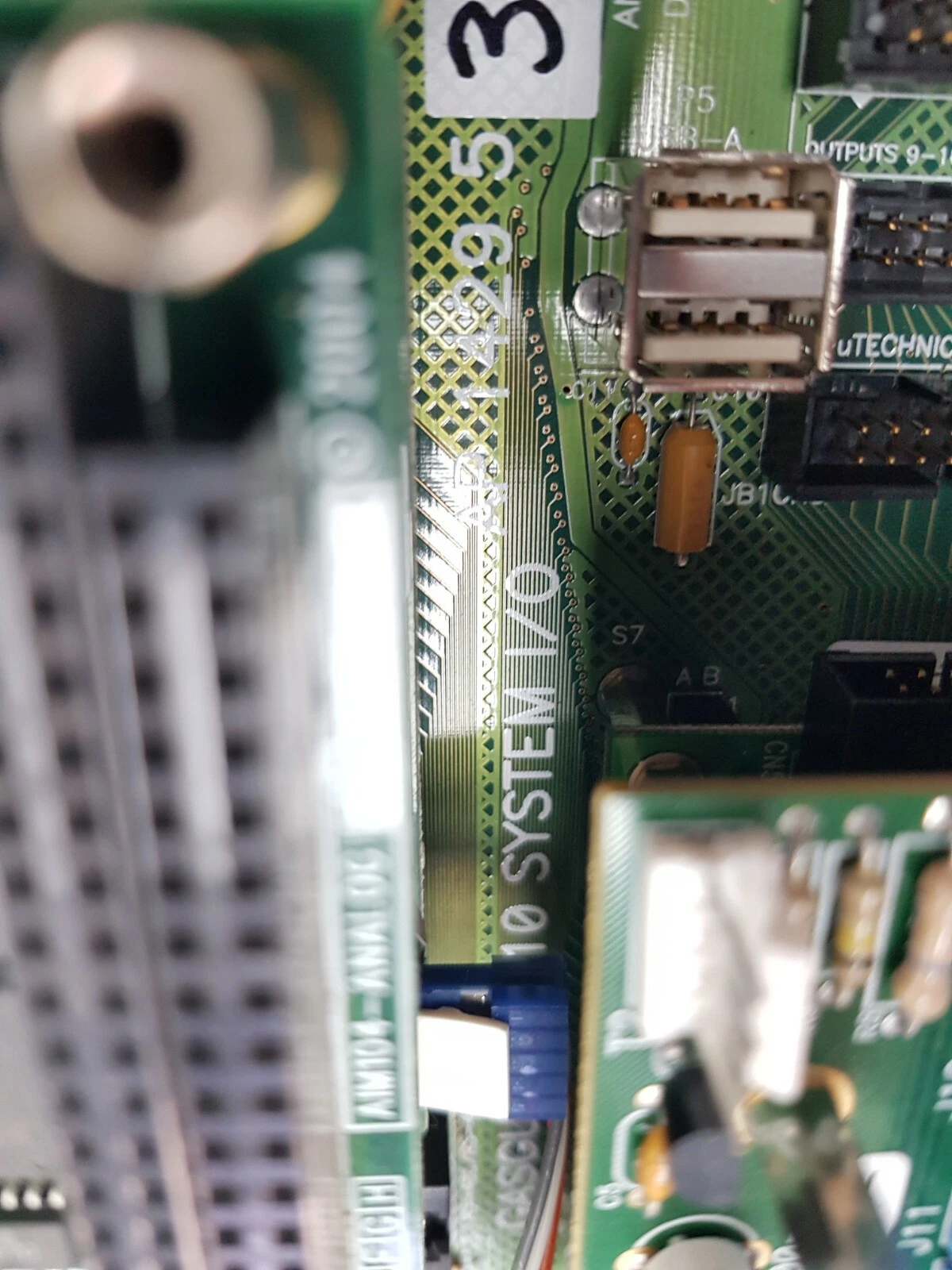 AP10 System I/O silkscreen and part number AP14295 on the Gasguard board