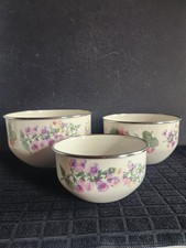 3 Enamelware Nesting Bowls with Floral Pattern & Birdhouse • 7¾"• 7"• 5⅞" Diam.