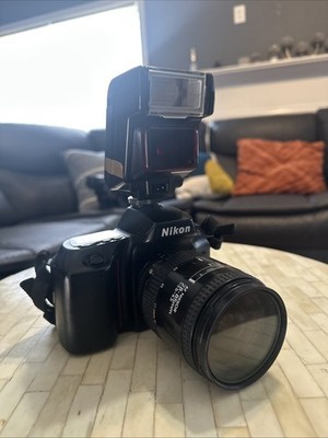 Nikon N70 35mm SLR Film Camera w/ 28-85mm lens / Speed light Attachment & Strap