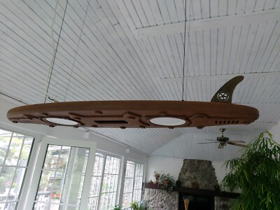Handcrafted surfboard-shaped pendant light, covered with iron, steampun