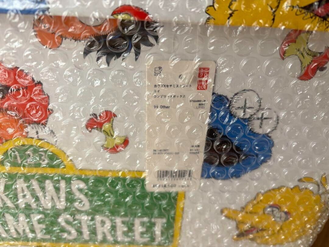 Kaws x UNIQLO Sesame Street Plush Doll Complete Box set 5 Kaws x UNIQLO Sesame Street Plush Doll Complete Box set 5