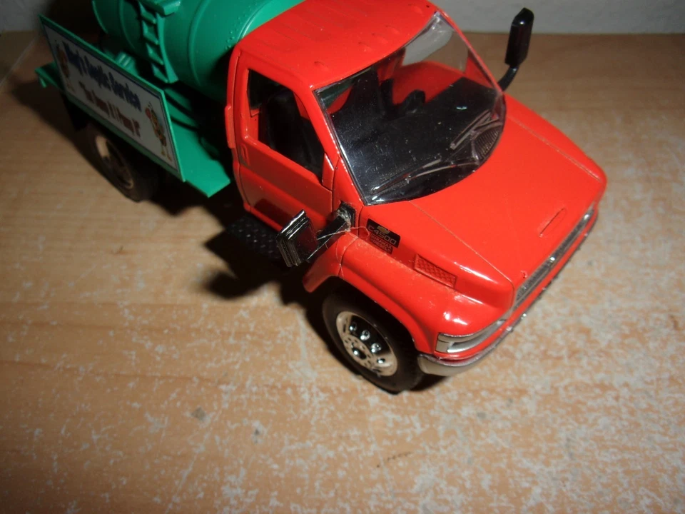 New Ray Chevy Kodiak C4500 Custom Septic Tank Pumper Truck Orange 1:43 - Image 3 of 4