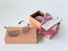 Miu Miu SMU A51 Wrap Sunglasses Pale Gold Frame Grey Lens Women 75mm