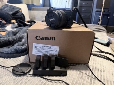 Canon EOS R50 v Mirrorless Camera with 14-30mm f/4-6.3 Lens With Triple Charger