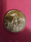 1 Ounce - 50 Zombucks "The Saint" .999 Silver Round