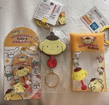 Sanrio Pompompurin Chocolate Multi Case Mascot Charm, Rubber Reel,
