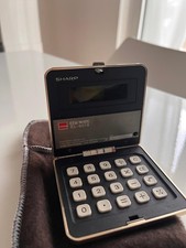 Calcolatrice elettronica tascabile  Sharp EL-8019 ELSIMATE vintage