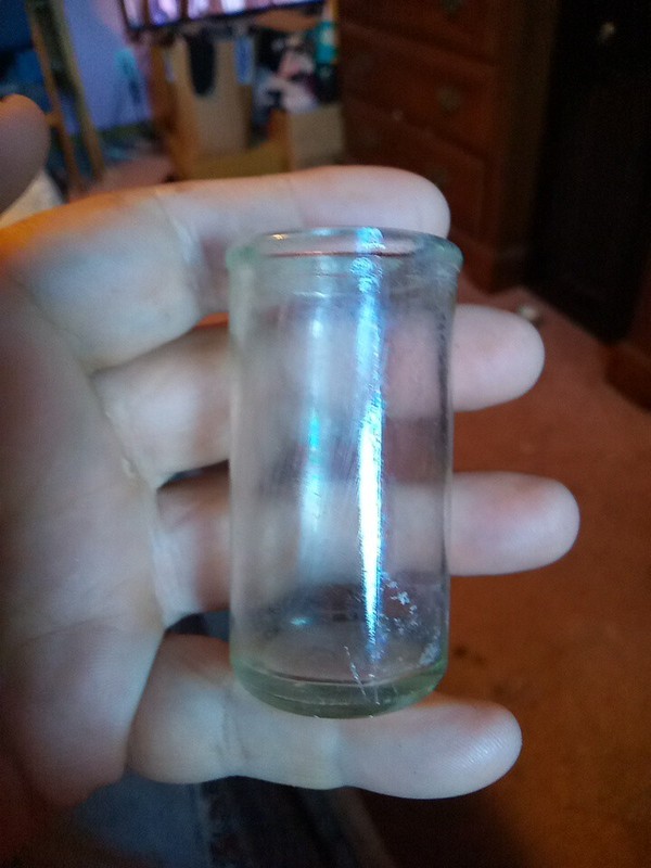 Vintage Two And A Half Inch Clear Glass Bottle