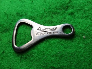 vintage small GUINNESS bottle opener