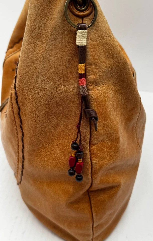 Bolso de hombro The Sak para mujer de cuero marrón con bolsillo interior con asa trenzada Foto 4 de 4