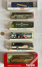 LOT OF 6 TOY BUSES. VINTAGE. IN BOXES .