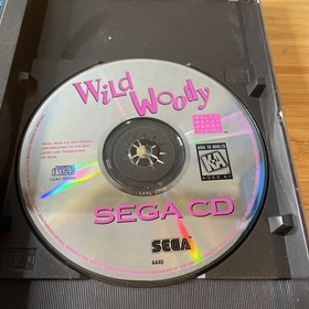 Wild Woody - Sega CD - CIB w/ Registration Card - Cracked Case