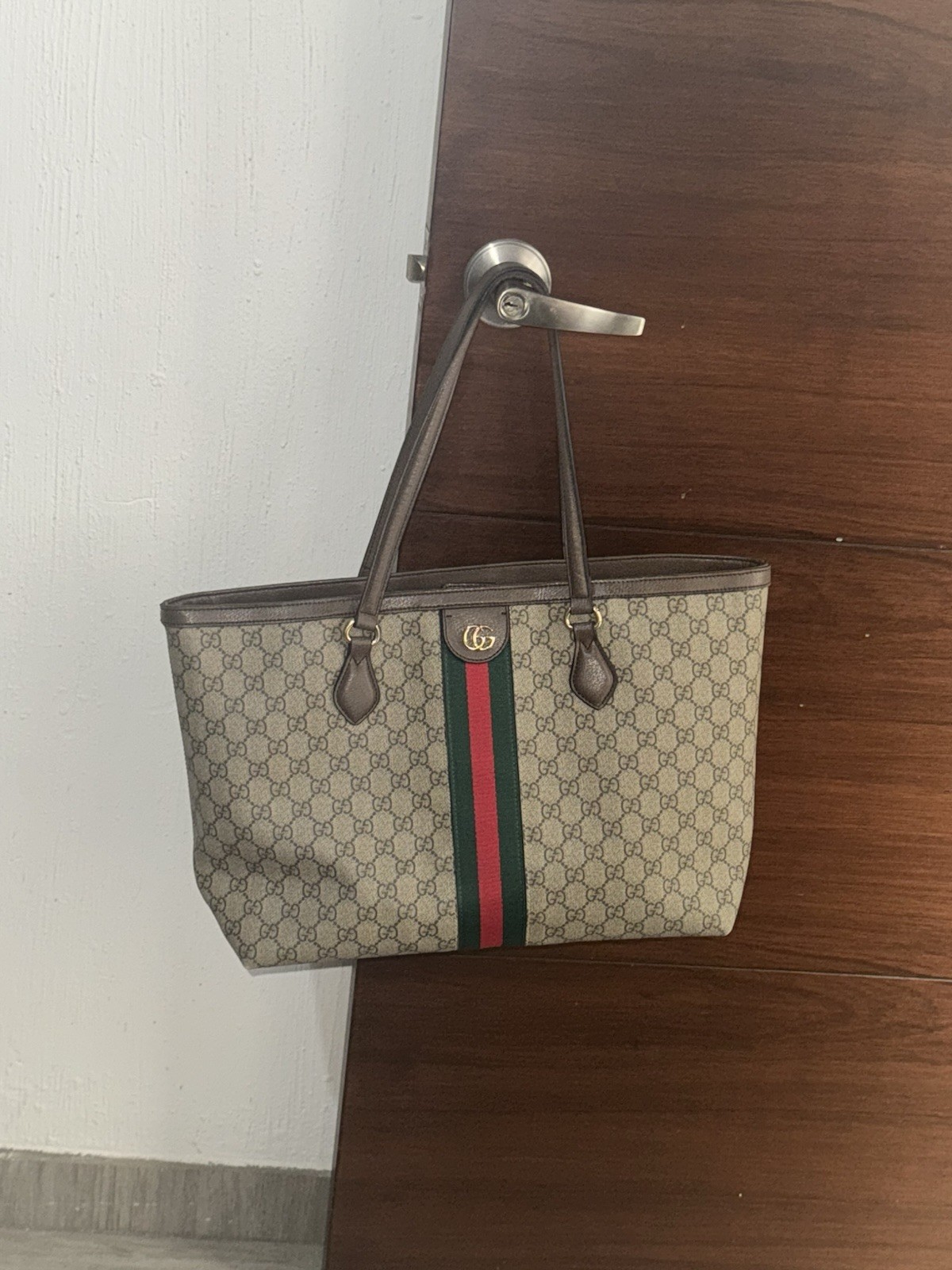 Pre Owned Guccis Ophelia Brown Leather Handbag with Gold Engravings