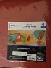 New In Package Four Piece Flexible Cutting Mats Colorful! All 14in X 10in!